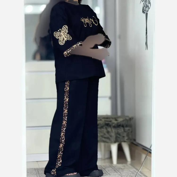 ست تی شرت و شلوار زنانه طرح enjoy جنس اسپان گلکسی رنگ مشکی سایز فری 38 تا 46