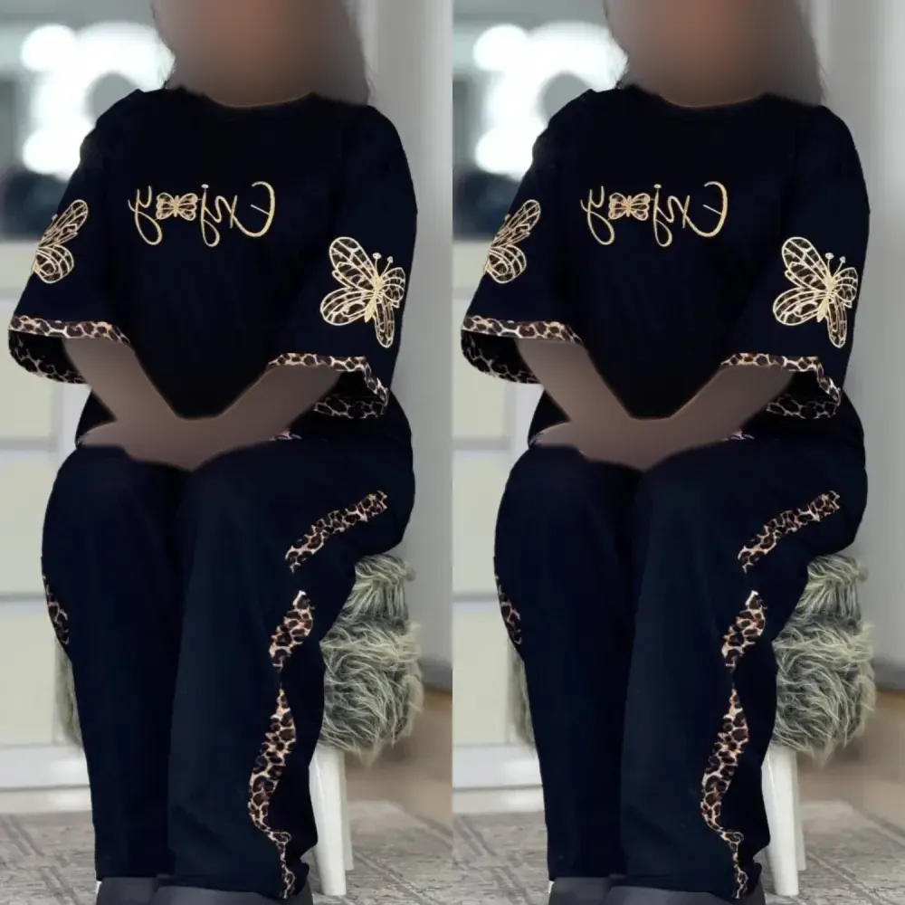 ست تی شرت و شلوار زنانه طرح enjoy جنس اسپان گلکسی رنگ مشکی سایز فری 38 تا 46
