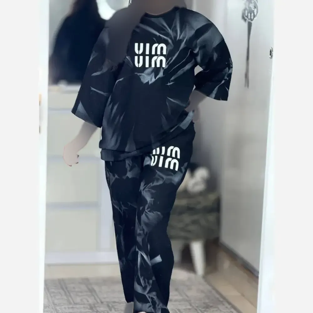 ست ماچا زنانه پنبه گلکسی فری سایز مشکی قد تیشرت 69 سانت قد شلوار 103 سانت