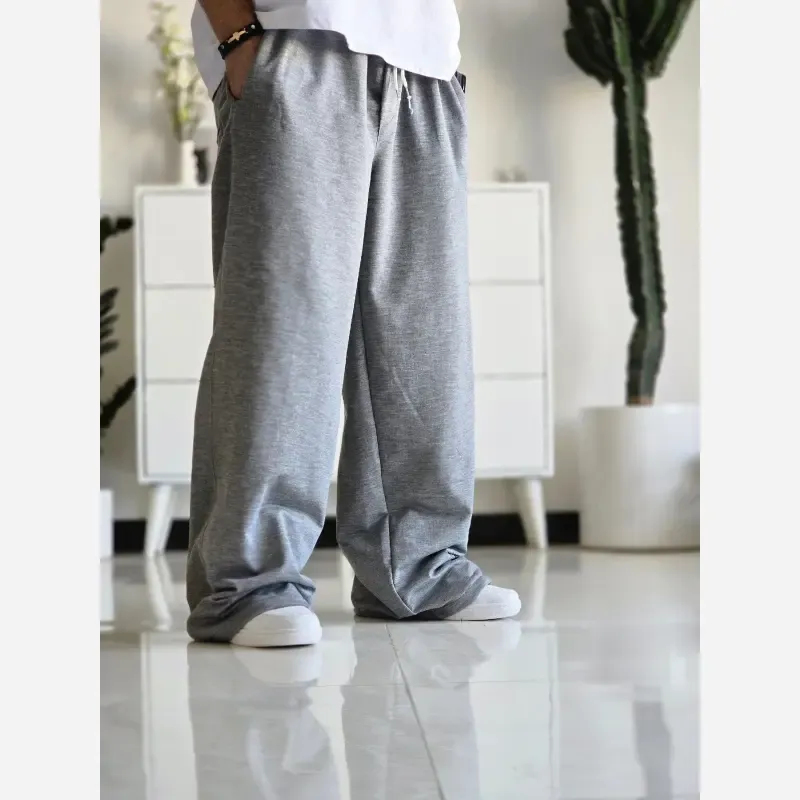 شلوار اسلش فول بگ پارچه ملانژ رنگ طوسی و مشکی سایز XXL و XXXL